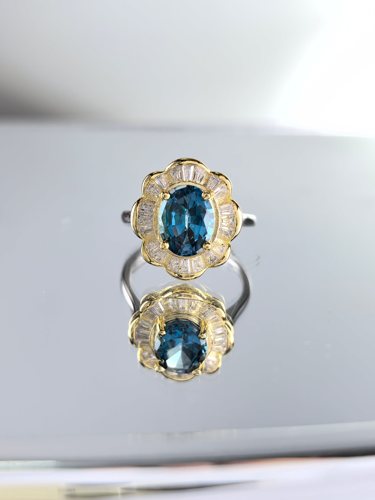 Wholesale Rhodium Plated 925 Sterling Silver Natural Swiss Blue Topaz Blue Gemstone Oval Cut Ring