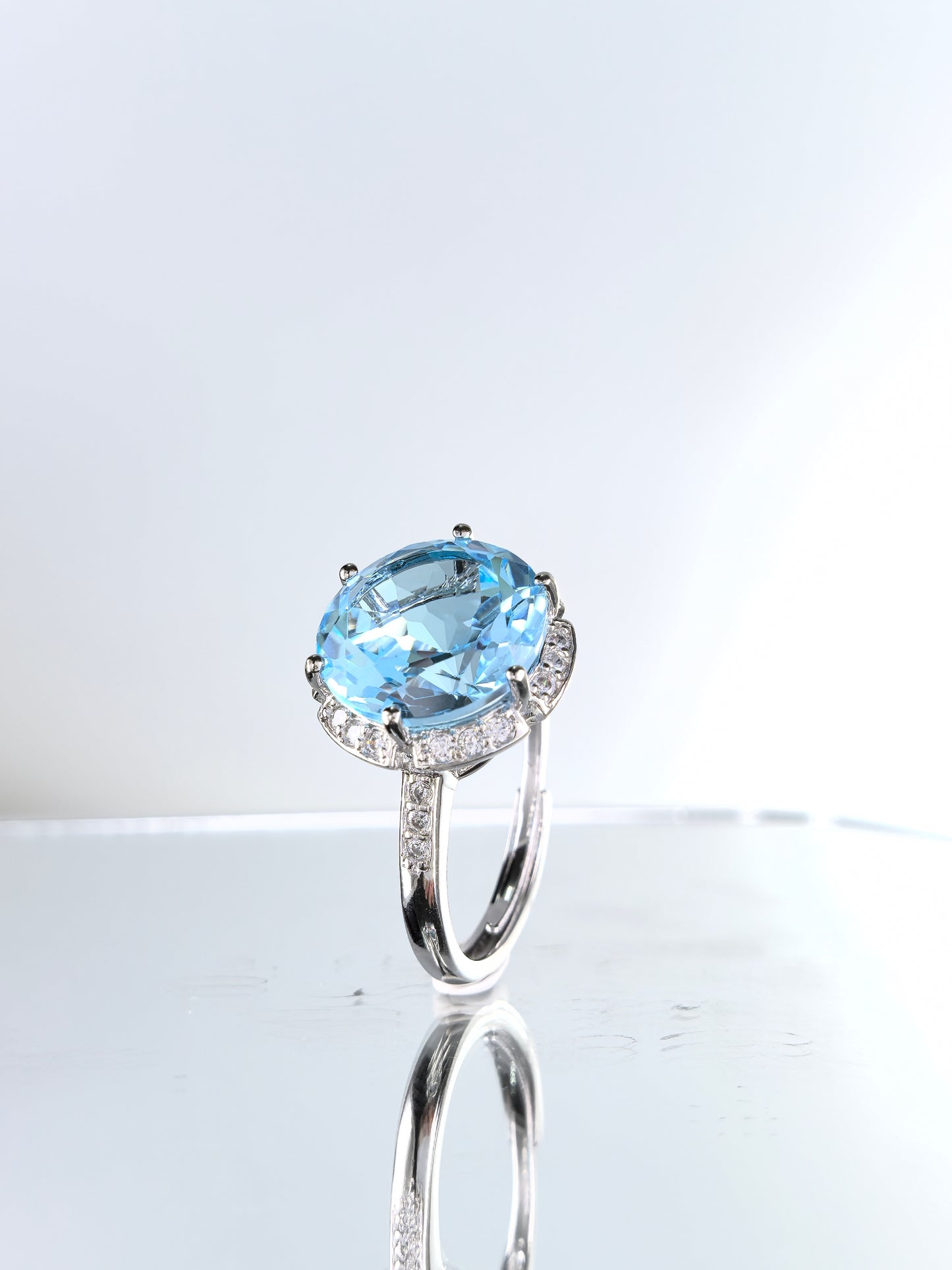 Wholesale Rhodium Plated 925 Sterling Silver Natural Sky Blue Topaz Blue Gemstone Round Ring