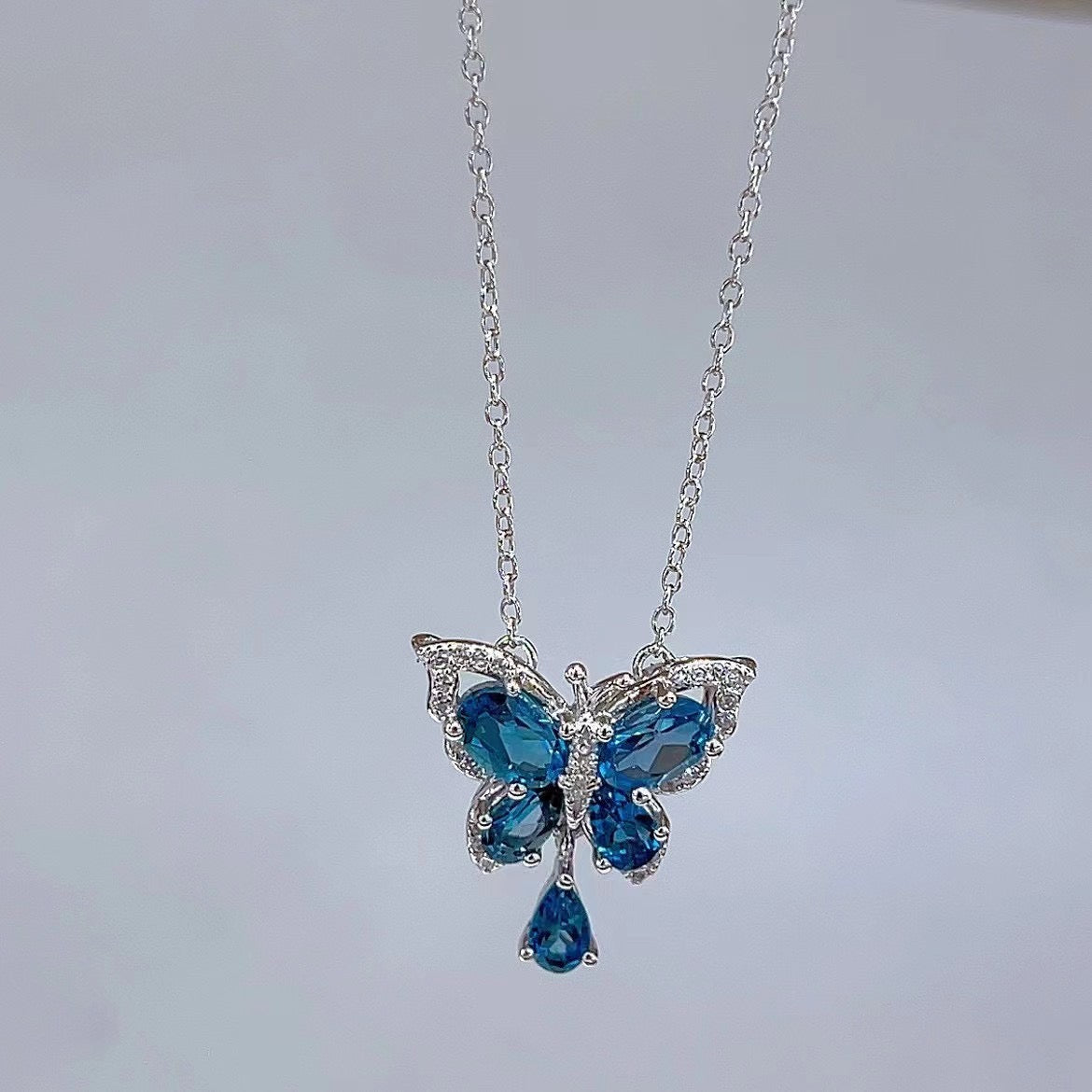 Wholesale Rhodium Plated 925 Sterling Silver Natural Topaz London Blue Butterfly Necklace