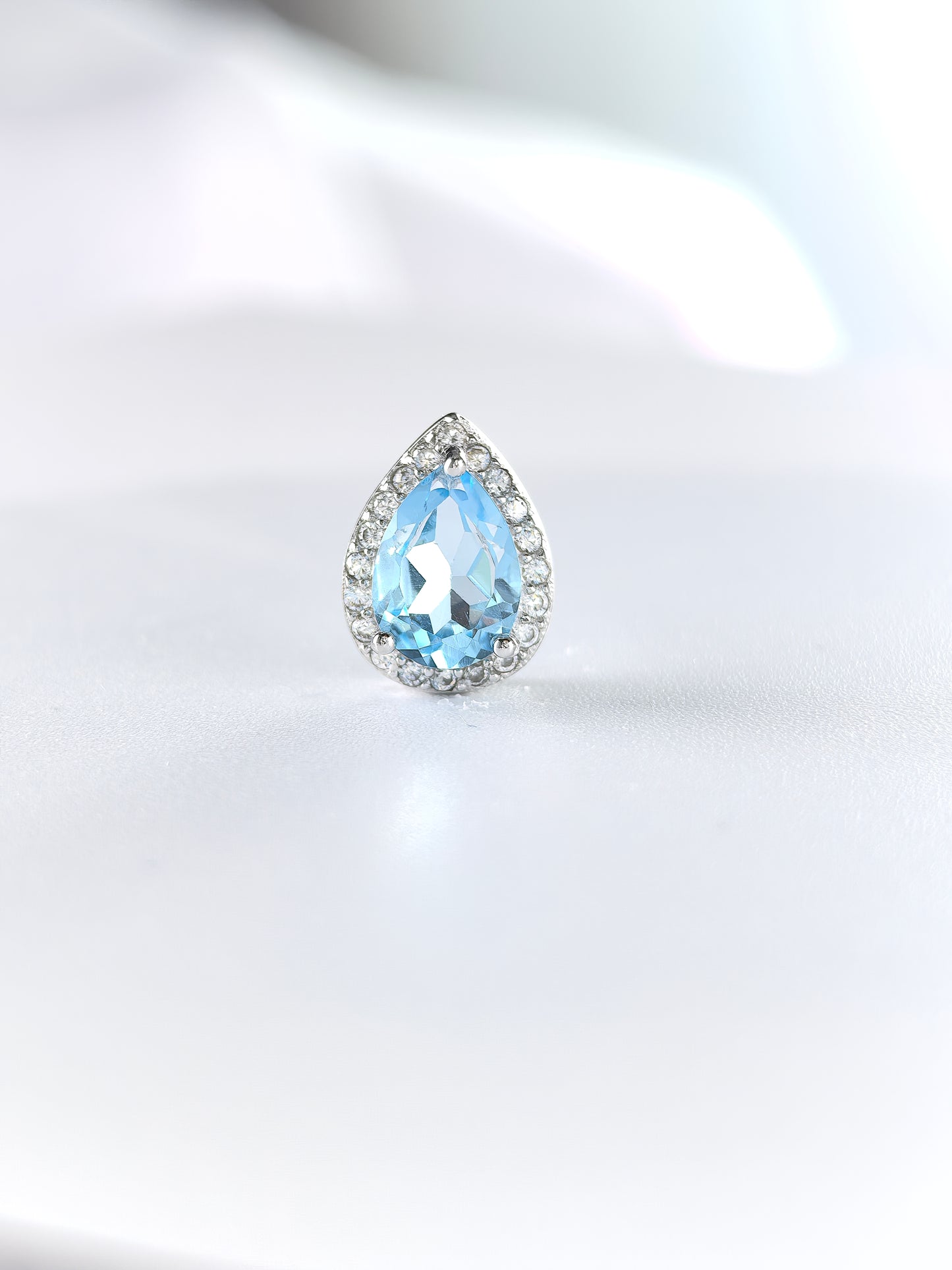 Wholesale Rhodium Plated 925 Sterling Silver Natural Sky Blue Topaz Blue Gemstone Pear Cut Stud Earrings